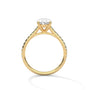 Oval diamond ring in yellow gold with four-prong setting and decorative shoulders