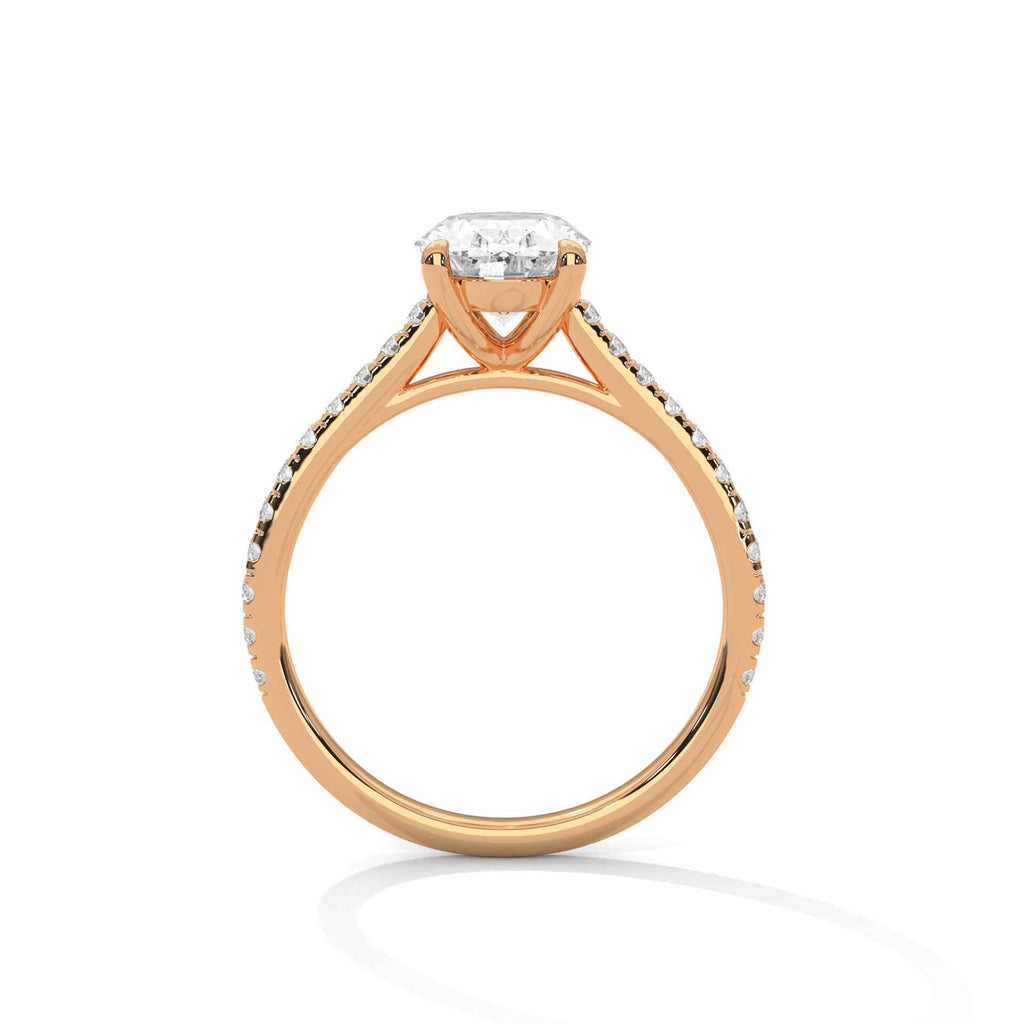 Oval engagement ring in rose gold with cathedral prongs and pavé-set shoulders