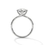 White gold diamond ring with a round center stone and twisted V-shaped setting
