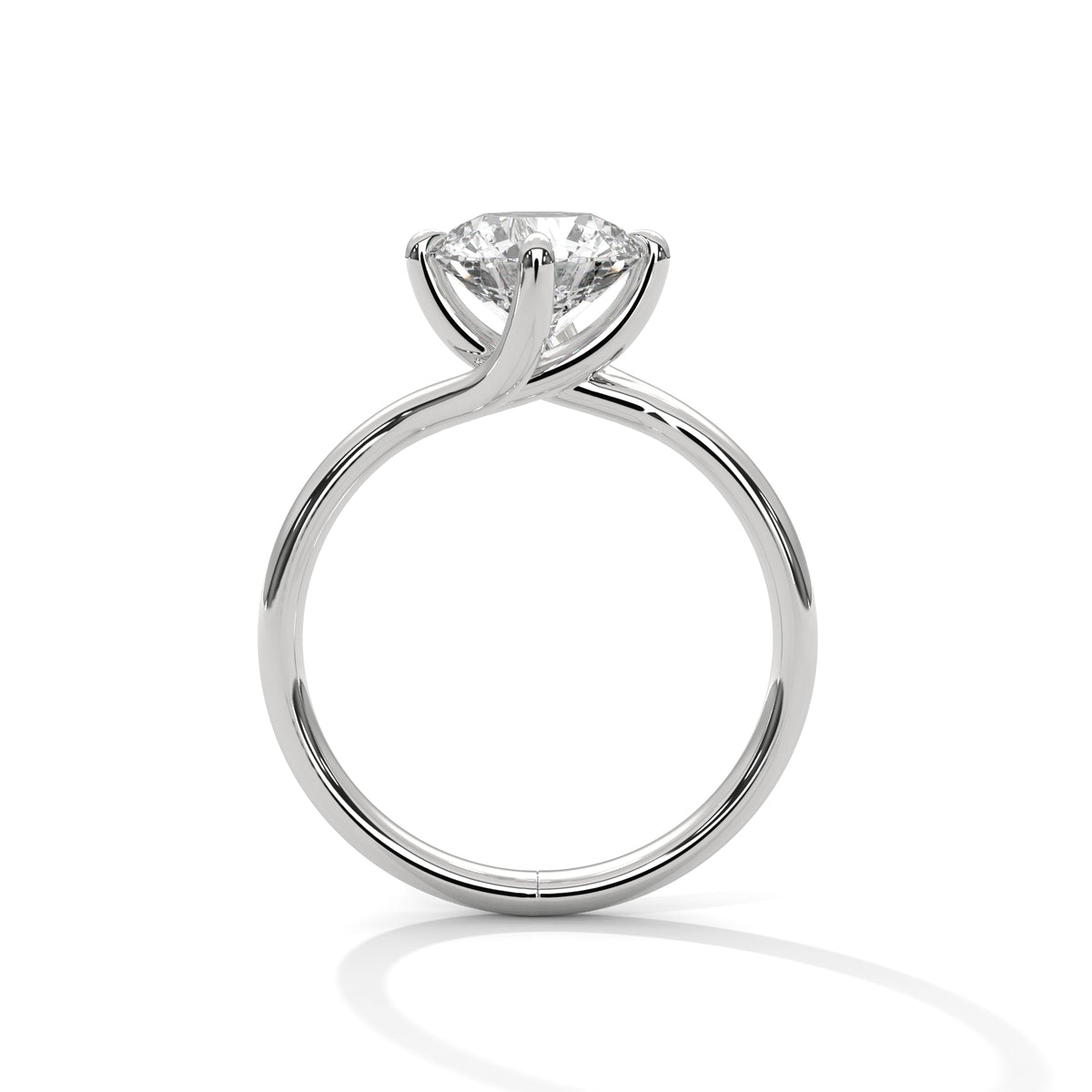 White gold diamond ring with a round center stone and twisted V-shaped setting