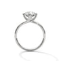 White gold diamond ring with a round center stone and twisted V-shaped setting