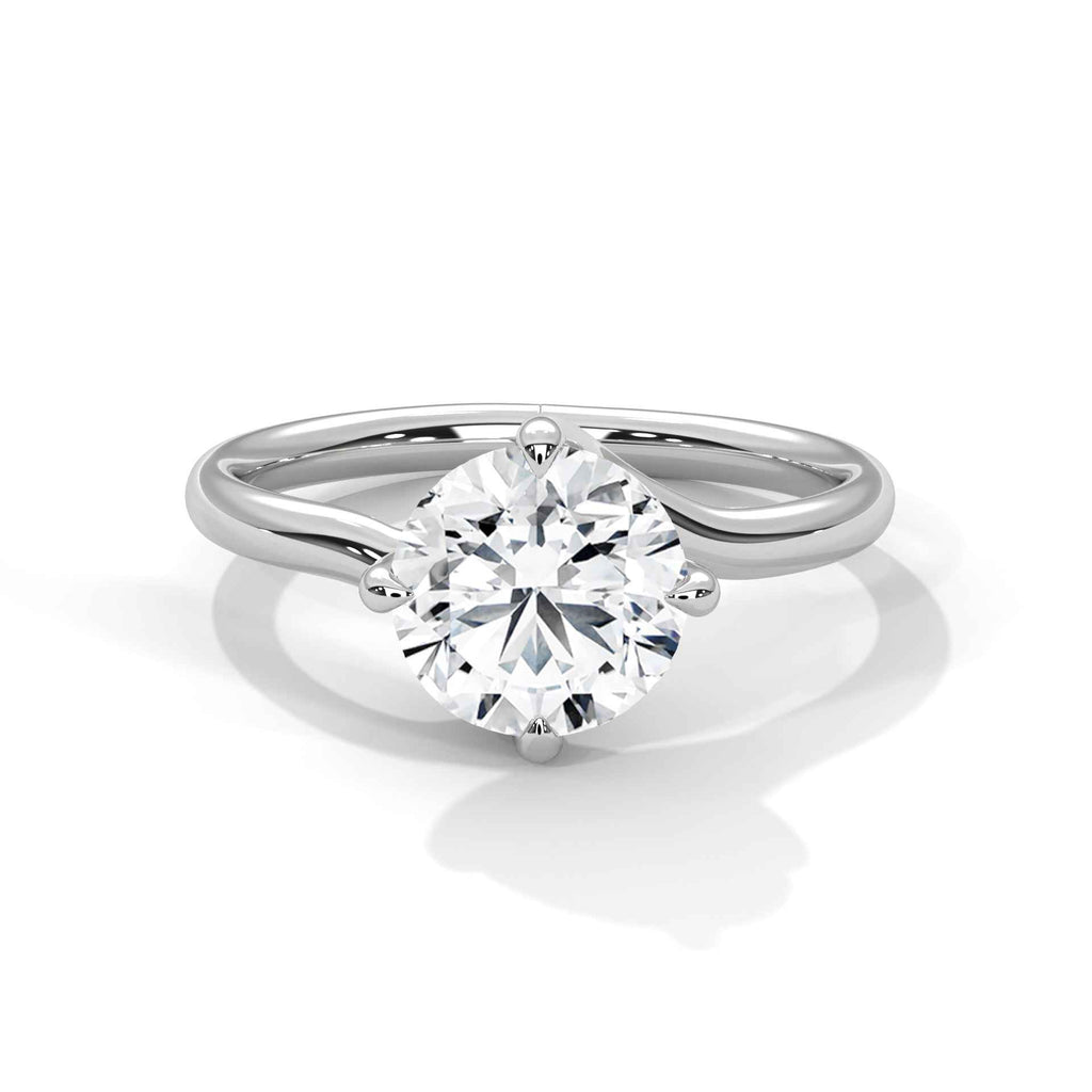 White gold round solitaire engagement ring with prong-set diamond and split band
