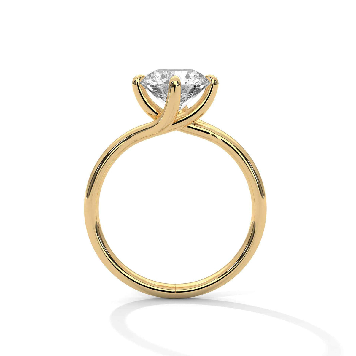 Yellow gold diamond ring with a round center stone and twisted V-shaped setting