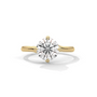 Yellow gold round diamond engagement ring with large center solitaire