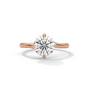 Rose gold round diamond engagement ring with large center solitaire