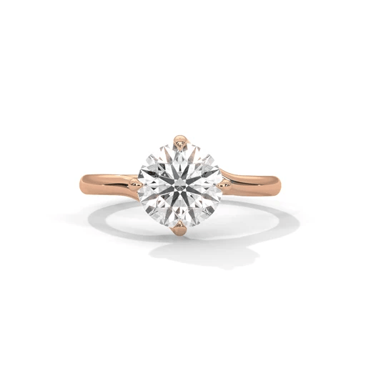Rose gold round diamond engagement ring with large center solitaire