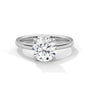 White gold round diamond solitaire ring, raised round center stone and slim band