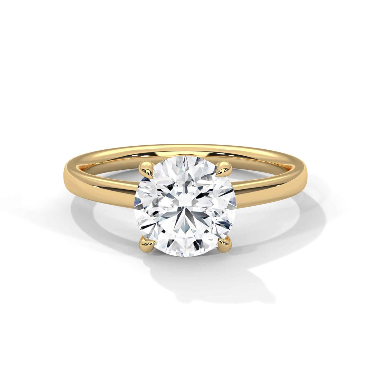 Yellow gold round diamond solitaire ring, raised round center stone