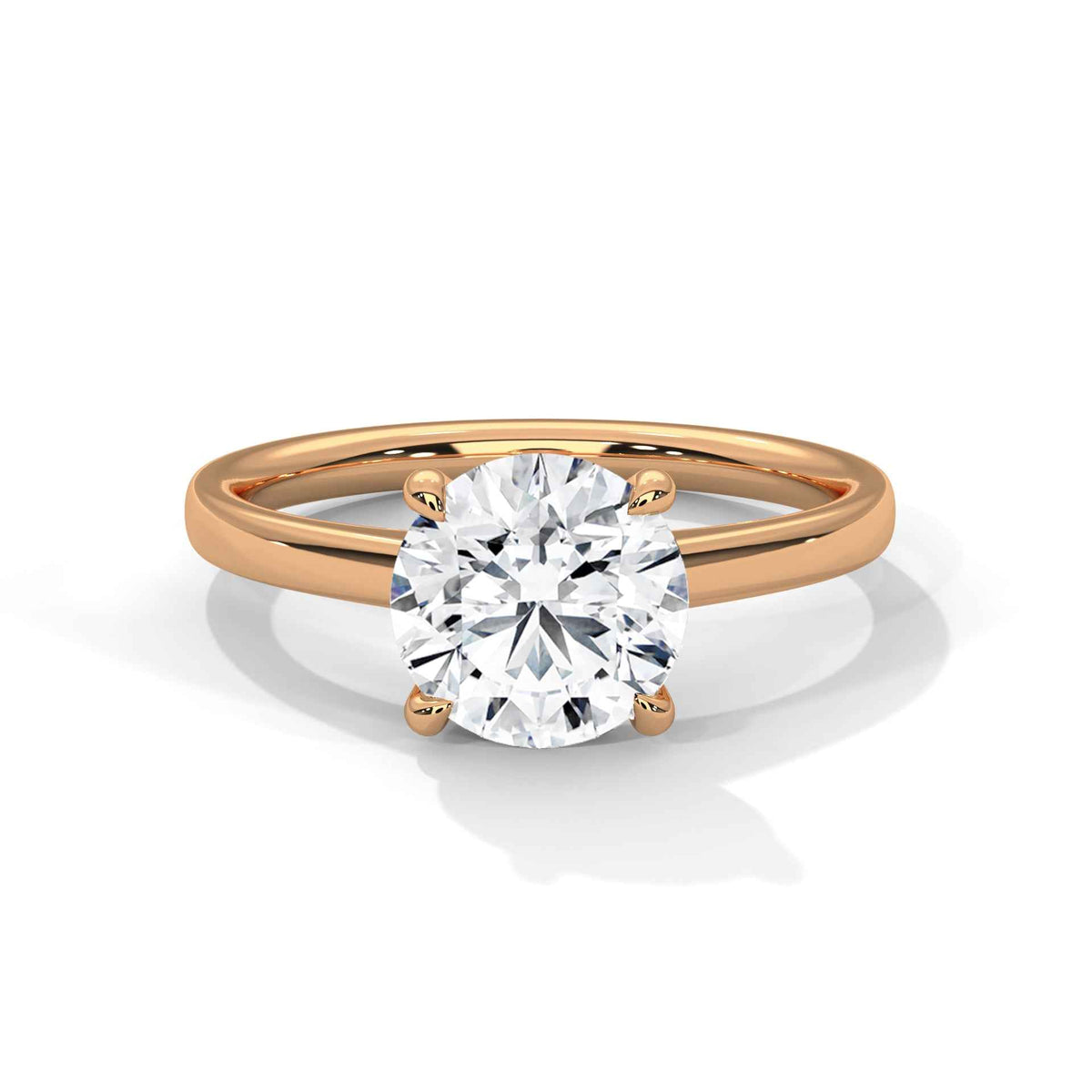Rose gold round diamond solitaire ring, raised round center stone