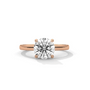 Rose gold round diamond solitaire ring, centered stone with four prongs