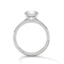 White gold diamond engagement ring with a shield-cut center stone and diamond sides