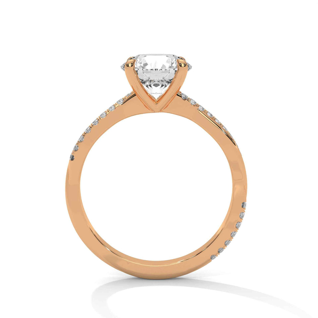 Rose gold diamond engagement ring with pavé side stones and raised center diamond