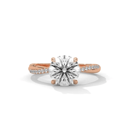 Rose gold diamond ring with a round center stone and side diamond accents