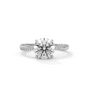 White gold diamond ring with a round center stone and side diamond accents