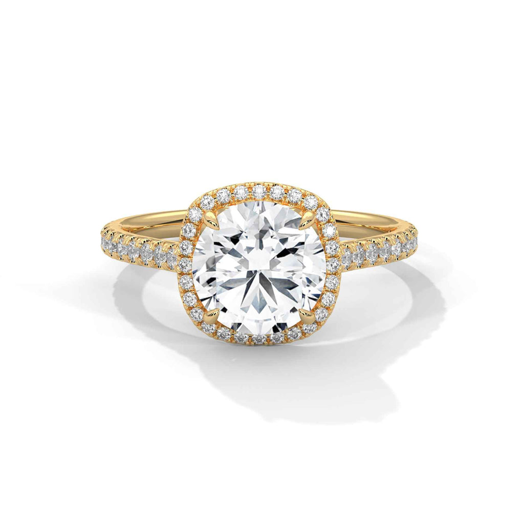 Yellow gold round-cut center diamond halo with pavé band and split-prong setting