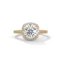 Cushion halo diamond ring with large cushion center and pavé halo in gold