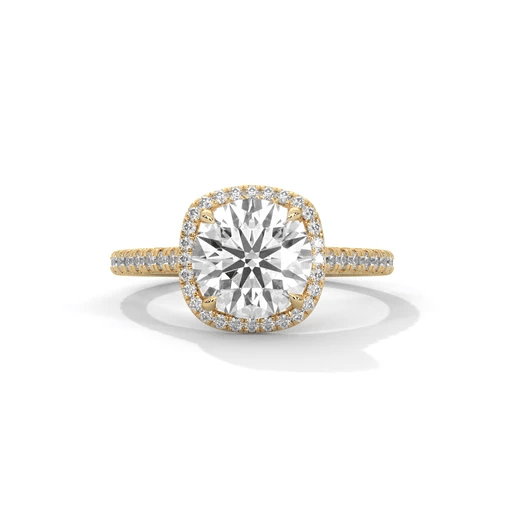 Cushion halo diamond ring with large cushion center and pavé halo in gold