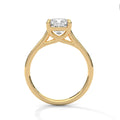 Yellow gold cushion-cut solitaire engagement ring, cathedral prong setting