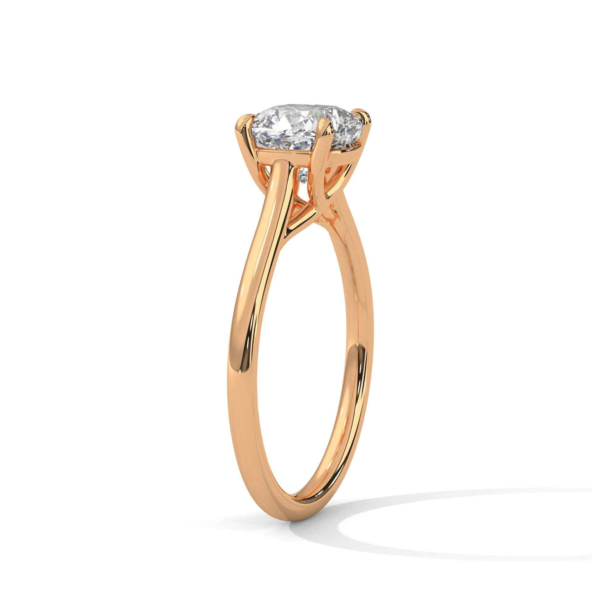 Rose gold cushion-cut solitaire ring with cathedral prongs