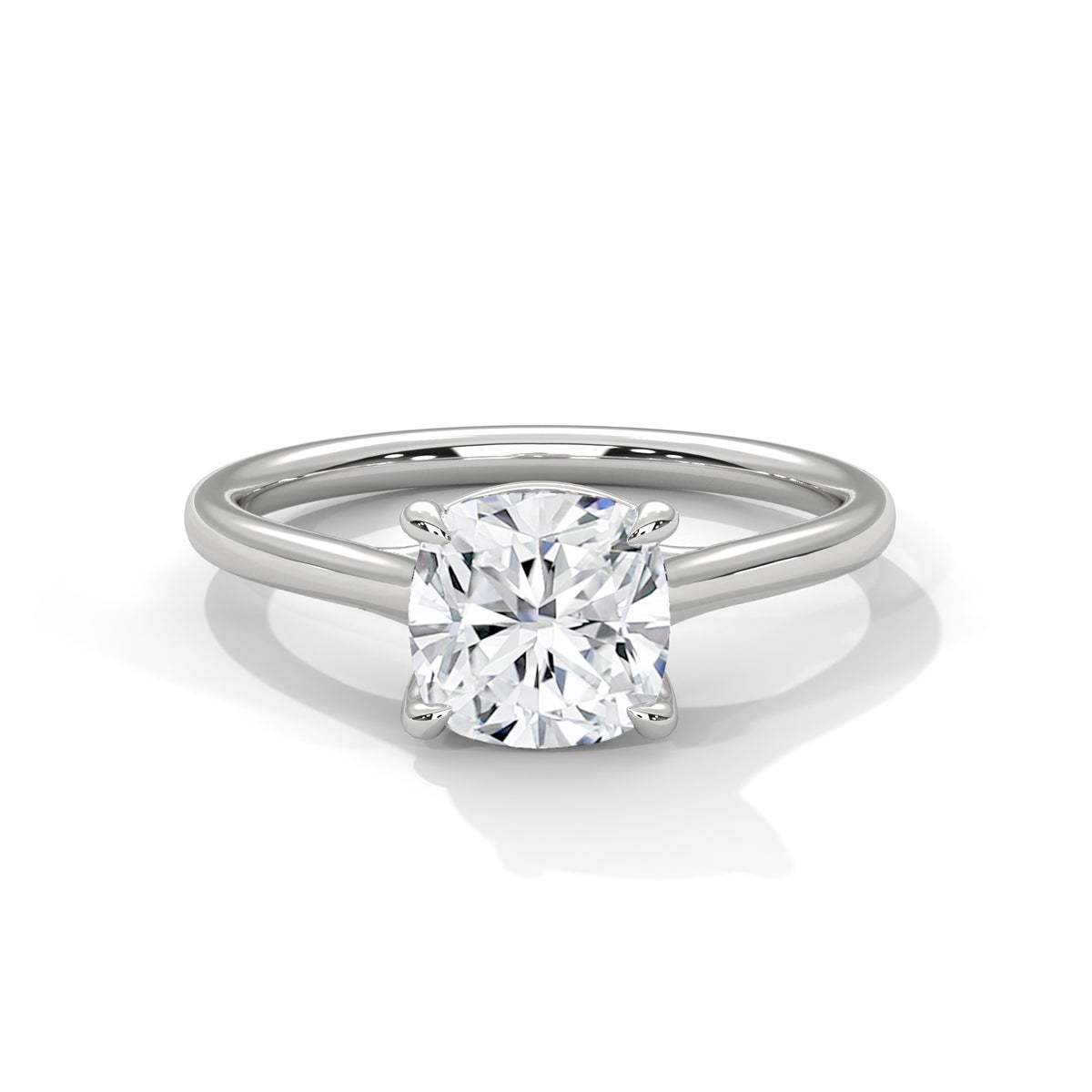 Platinum cushion solitaire ring with a cushion-cut diamond center