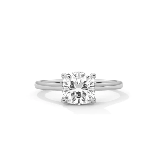 White gold cushion-cut diamond solitaire ring, four-prong setting