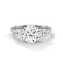 Three-stone diamond ring in platinum with a round center stone and two side stones