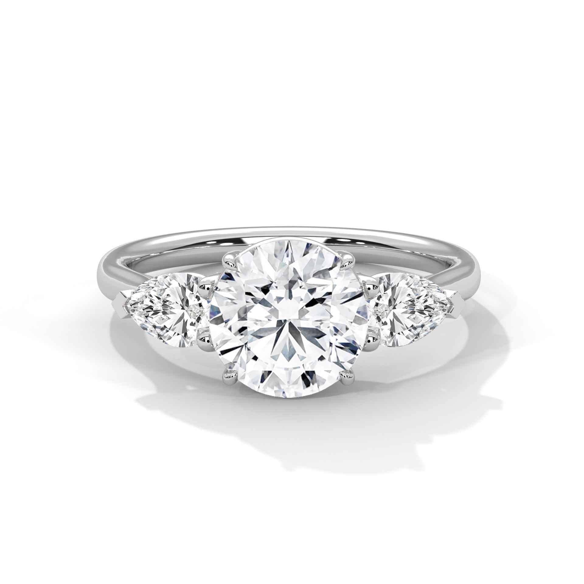 Platinum three-stone engagement ring with round center and round side stones