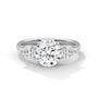 Three-stone diamond ring in platinum with a round center stone and two side stones