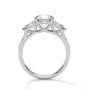 Three-stone diamond ring in platinum with round center stone and side stones, top view