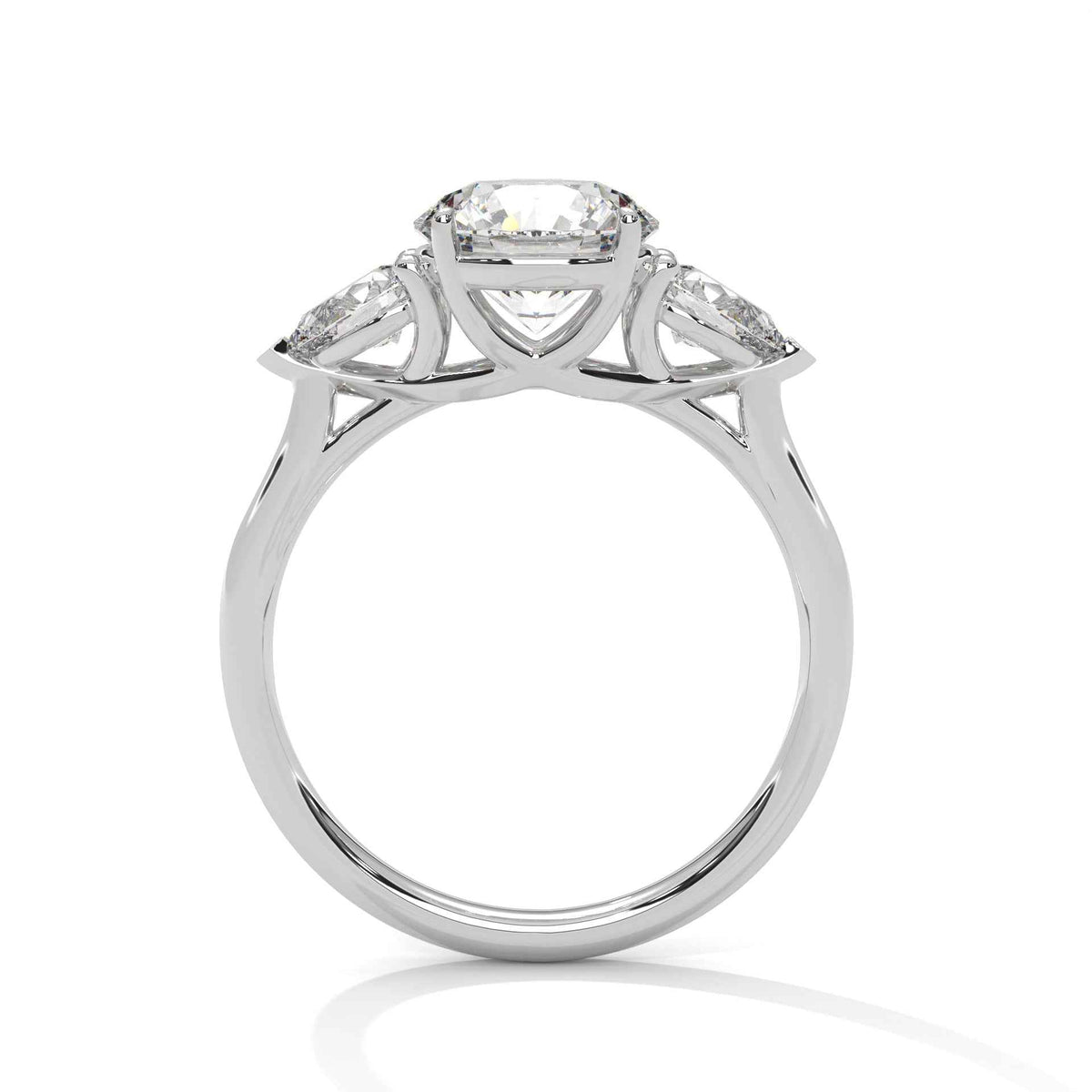 Three-stone diamond ring in platinum with round center stone and side stones, top view