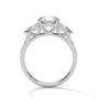 Three-stone diamond ring in platinum with round center stone and side stones, top view