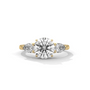 Three-stone diamond ring in yellow gold with a round center diamond and two side diamonds