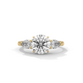 Three-stone diamond ring in yellow gold with a round center diamond and two side diamonds