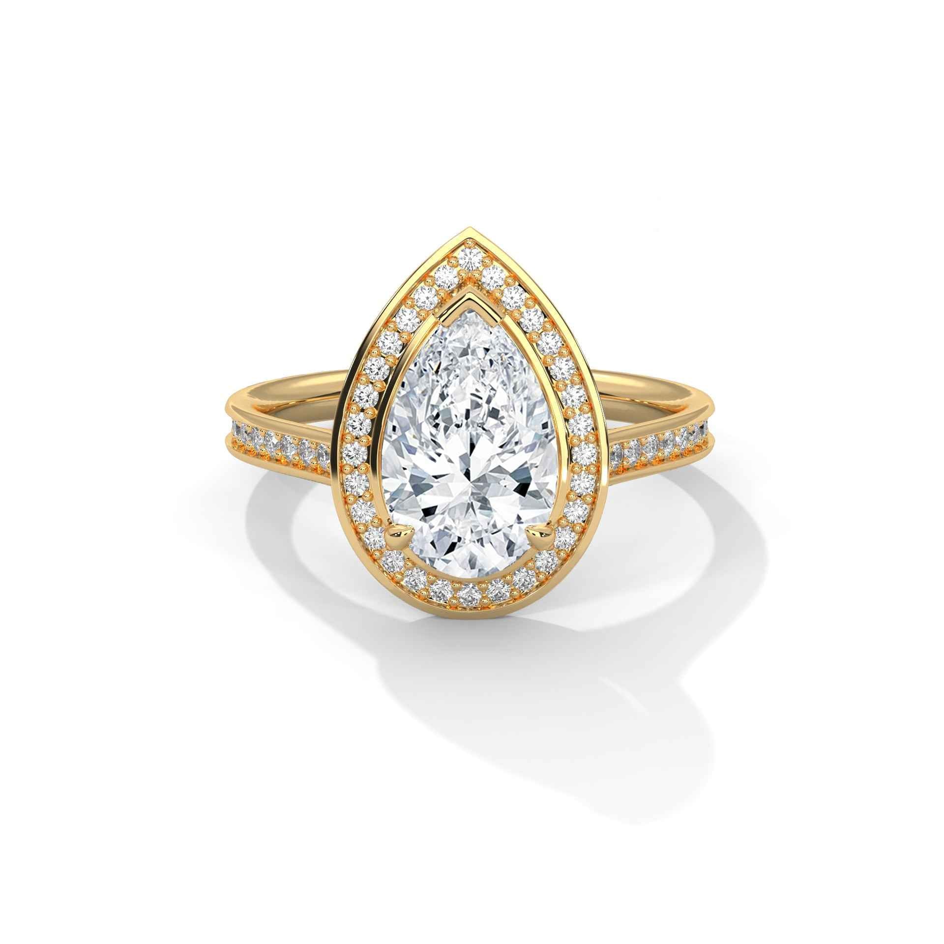 Pear halo diamond ring, yellow gold with large pear center and pavé accents.