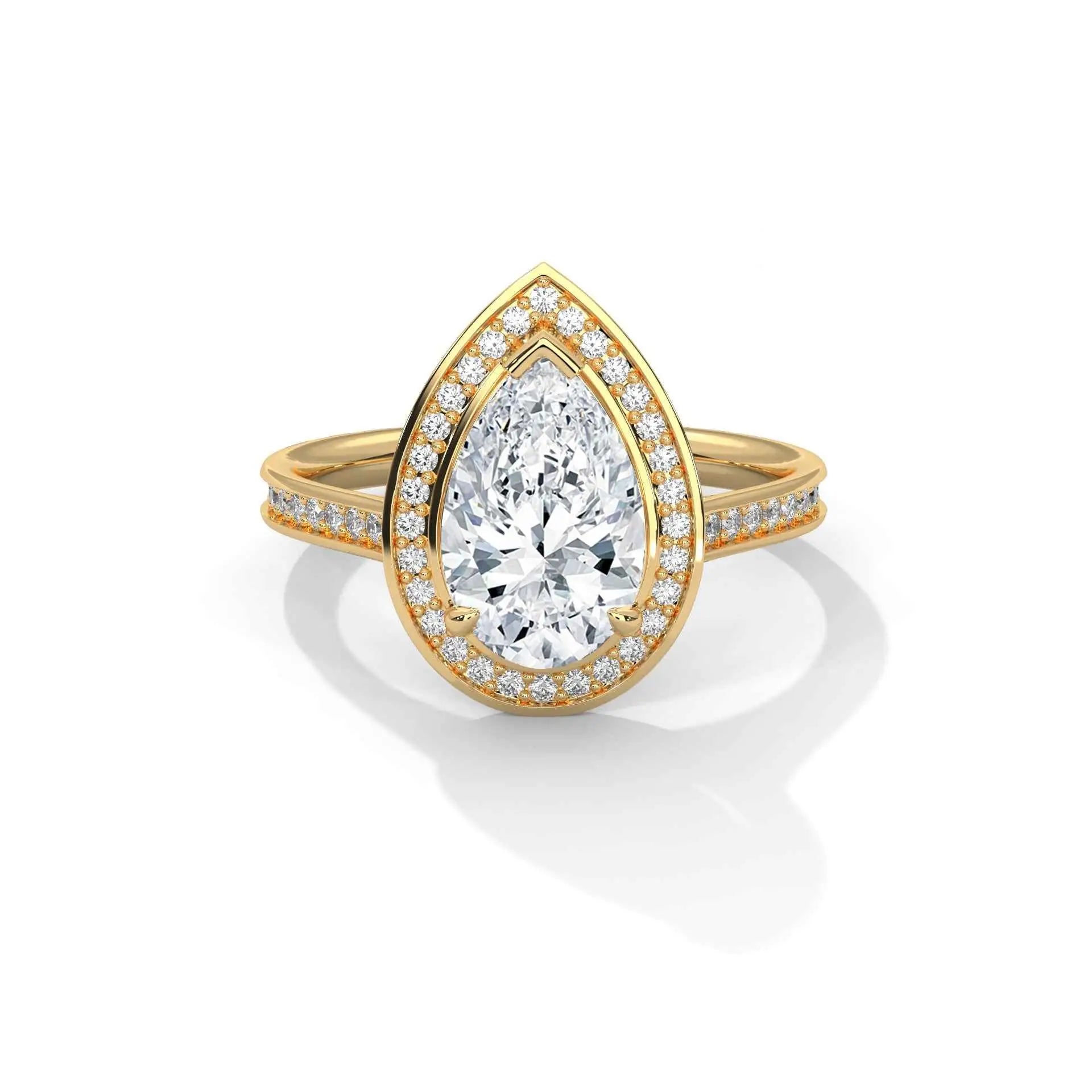 Pear halo diamond ring, yellow gold with large pear center and pavé accents.