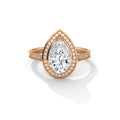 Rose gold pear halo engagement ring with diamond pavé band