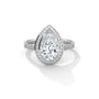 Pear halo diamond ring, platinum with pear-shaped center and pavé halo and band.