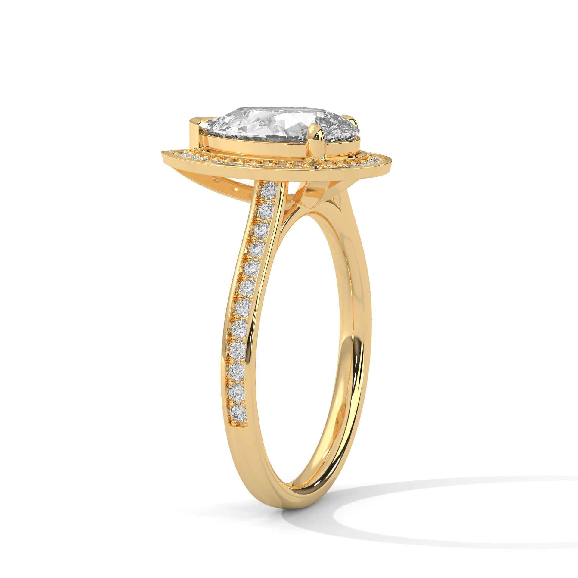 Yellow gold pear-cut halo engagement ring with pavé side stones