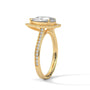 Pear halo diamond ring in yellow gold, side view with prong-set stone and pavé band.