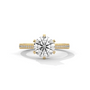 Yellow gold round diamond solitaire ring with pavé side stones