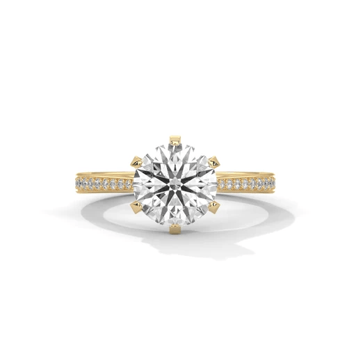Yellow gold round diamond solitaire ring with pavé side stones