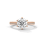 Rose gold round diamond solitaire ring with pavé side stones