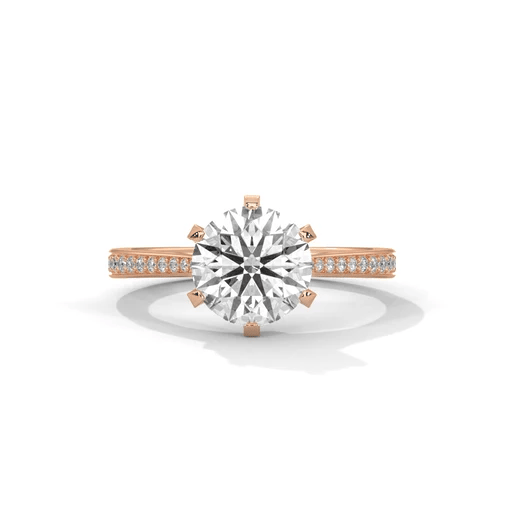 Rose gold round diamond solitaire ring with pavé side stones