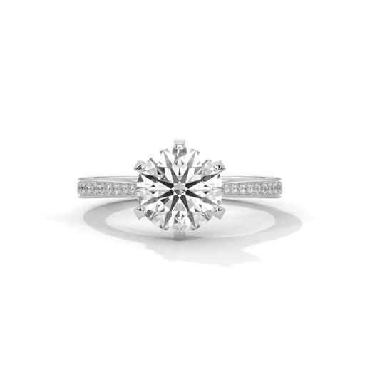 White gold round diamond solitaire ring with pavé side stones