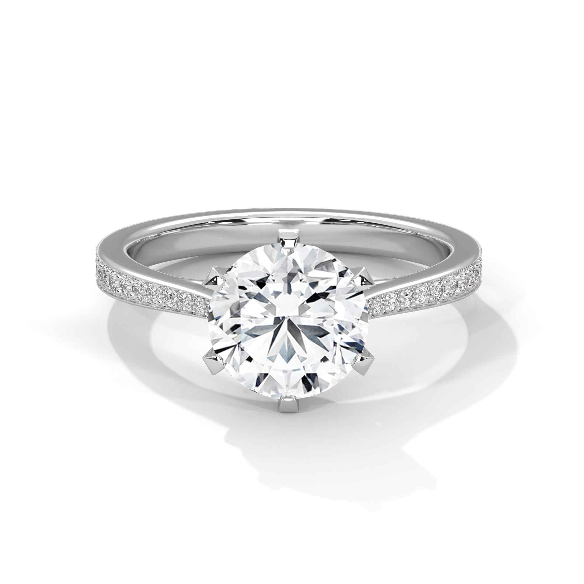 White gold solitaire engagement ring with round center diamond and pavé band