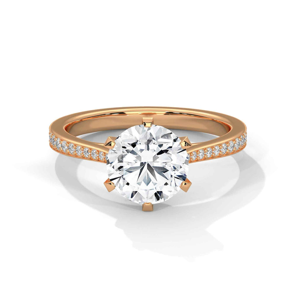 Rose gold solitaire engagement ring with round center diamond and pavé band
