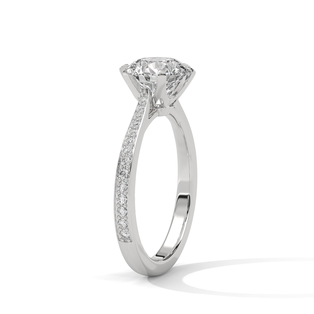 White gold solitaire engagement ring with round center diamond and six-prong setting