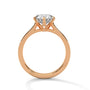 Rose gold round diamond solitaire ring with three-prong basket setting