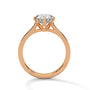Rose gold round diamond solitaire ring with three-prong basket setting