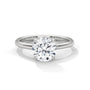 White metal solitaire engagement ring with round diamond and slim band